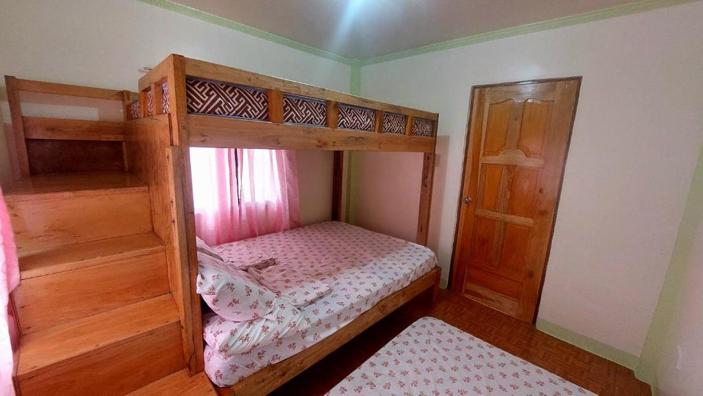 Postel nebo postele na pokoji v ubytování Mariden Resort & Homestay Siargao