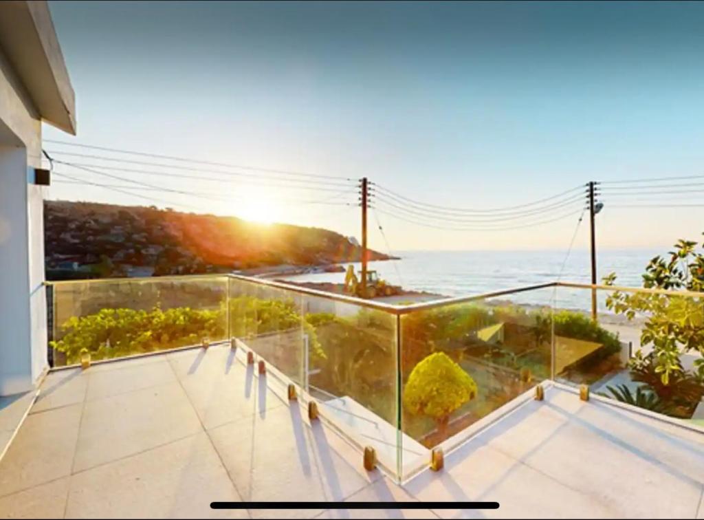 a view of the ocean from the balcony of a house at Villa Denizim in Kyrenia
