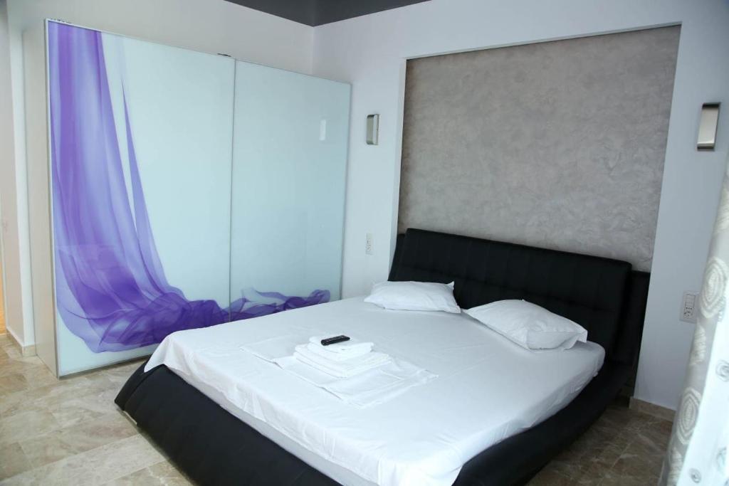 Postel nebo postele na pokoji v ubytování Sophia 2 & Moonlight Apartaments