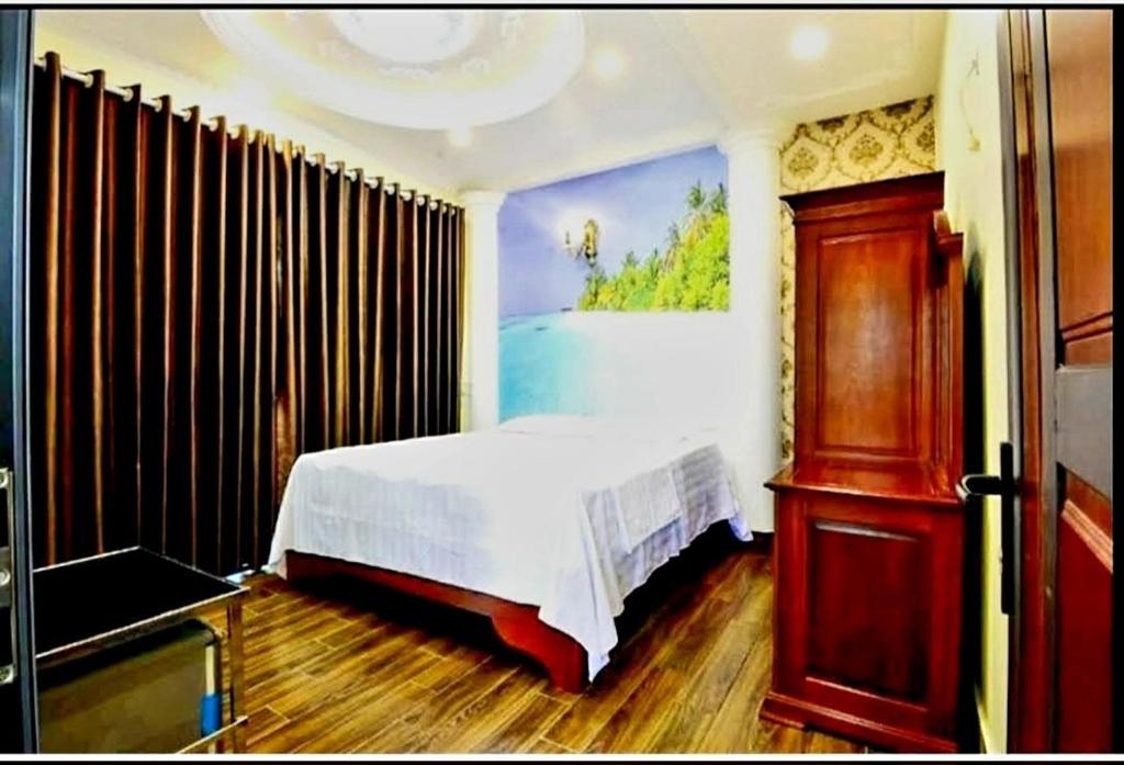 Postel nebo postele na pokoji v ubytování HAPPY GUEST HOUSE