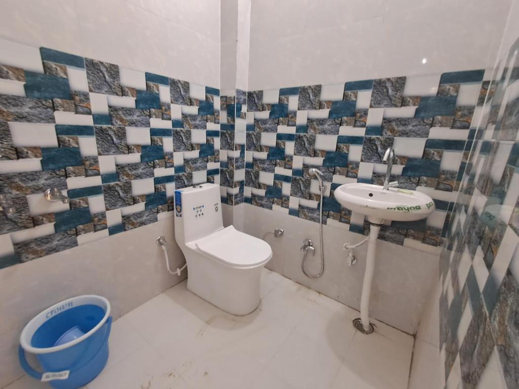 Koupelna v ubytování Satwik Homestay