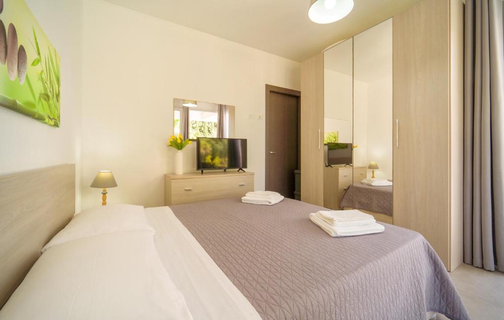 Postel nebo postele na pokoji v ubytování Casa Libasci