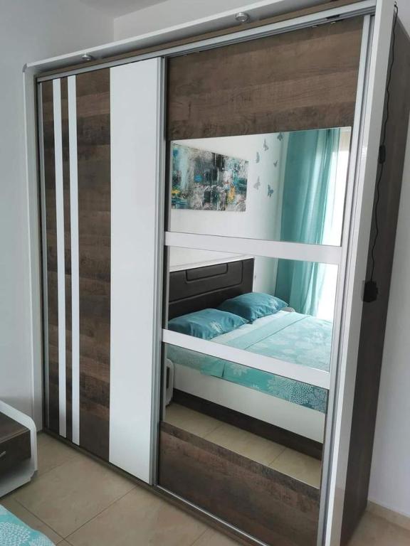 Postel nebo postele na pokoji v ubytování Апартамент Блу Поморие