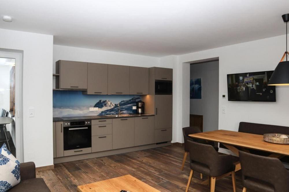 Kuchyň nebo kuchyňský kout v ubytování Apartment in Bramberg am Wildkogel with barbecue