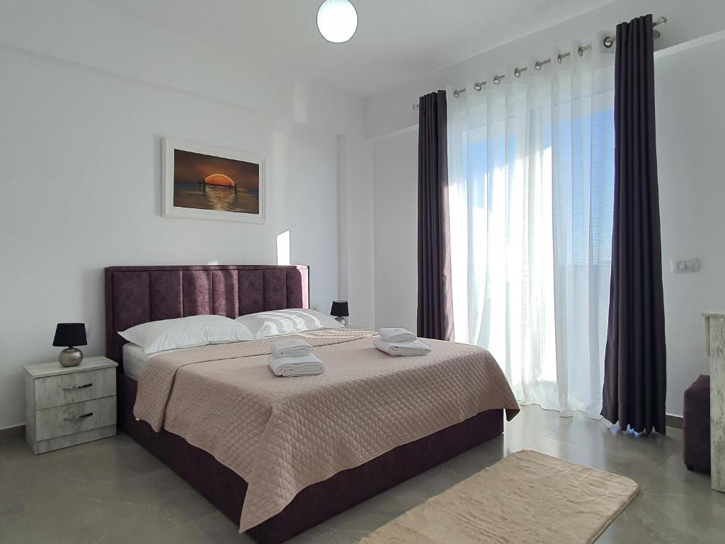 Ένα ή περισσότερα κρεβάτια σε δωμάτιο στο FLORE Rooms