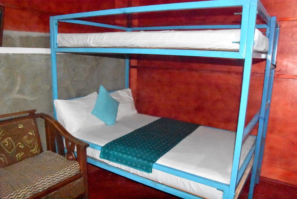 Postel nebo postele na pokoji v ubytování Blue Bed Hostel