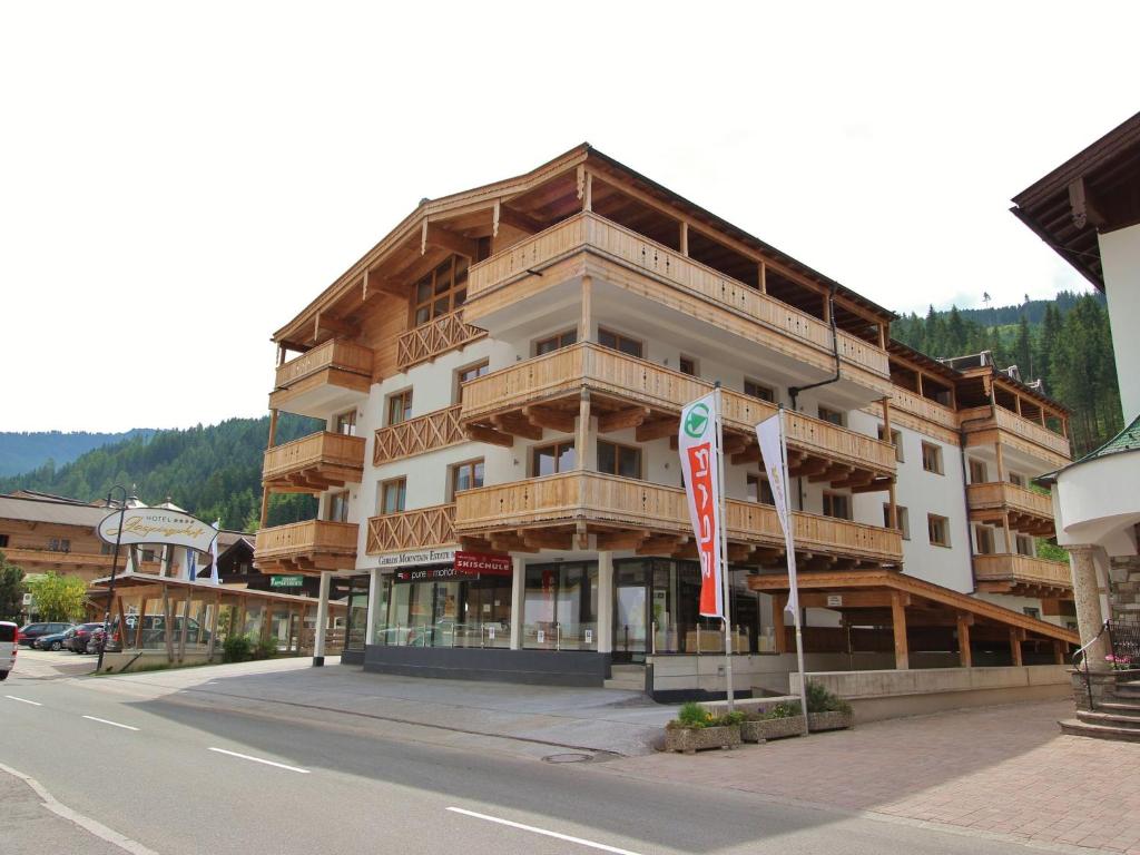 a large building on the side of a street at Luxurious Apartment with Sauna Garage Roof Terrace in Gerlos