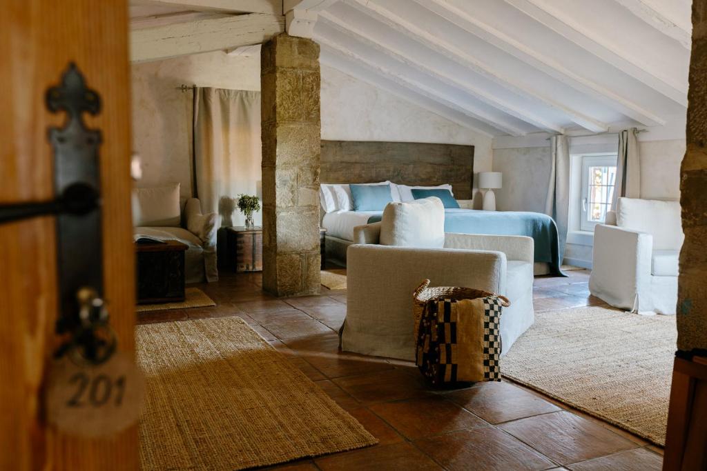Postel nebo postele na pokoji v ubytování Hotel Finca El Peregrino