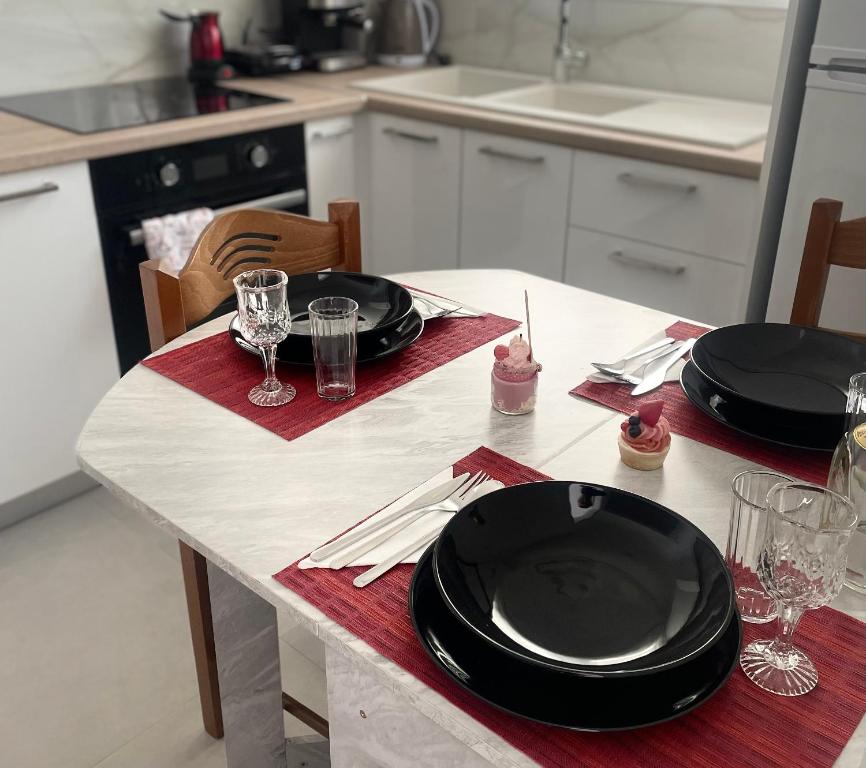 Kuchyň nebo kuchyňský kout v ubytování IRIS Apartment