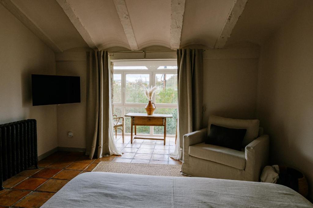 Postel nebo postele na pokoji v ubytování Hotel Finca El Peregrino