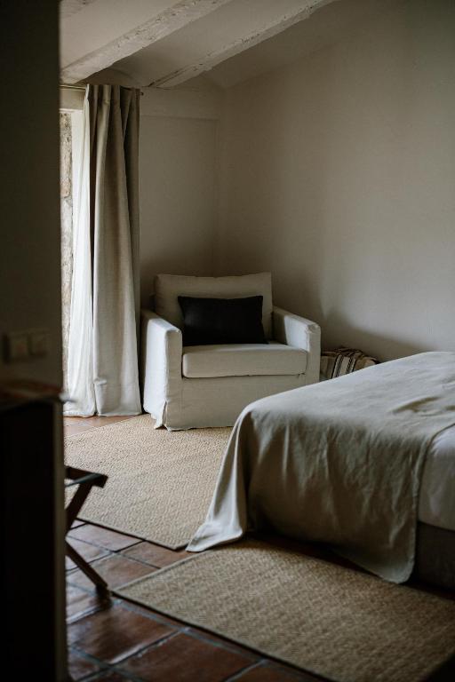 Postel nebo postele na pokoji v ubytování Hotel Finca El Peregrino