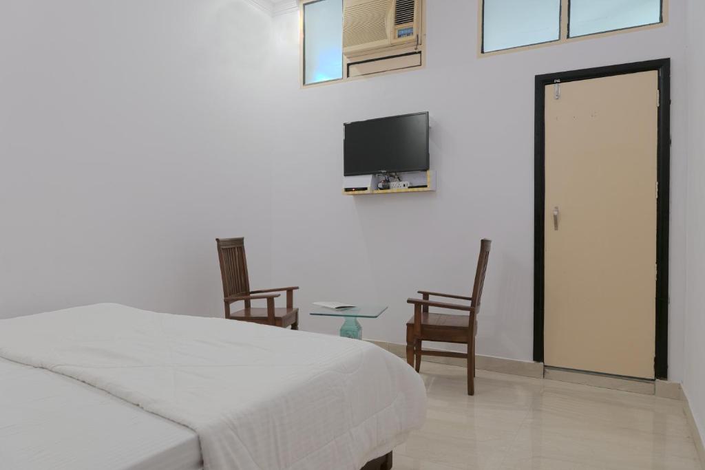 TV a/nebo společenská místnost v ubytování Embassy Suites