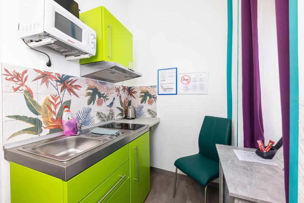 Amber Gardenview Studios Downtown - Resim 5