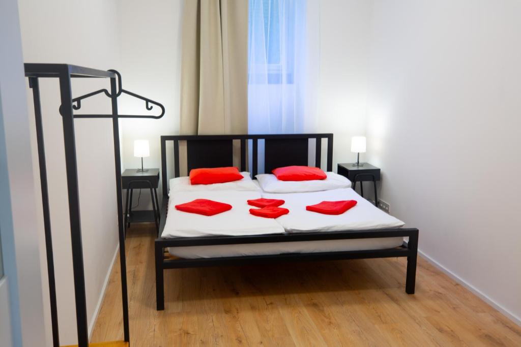 Postel nebo postele na pokoji v ubytování Budget Apartment