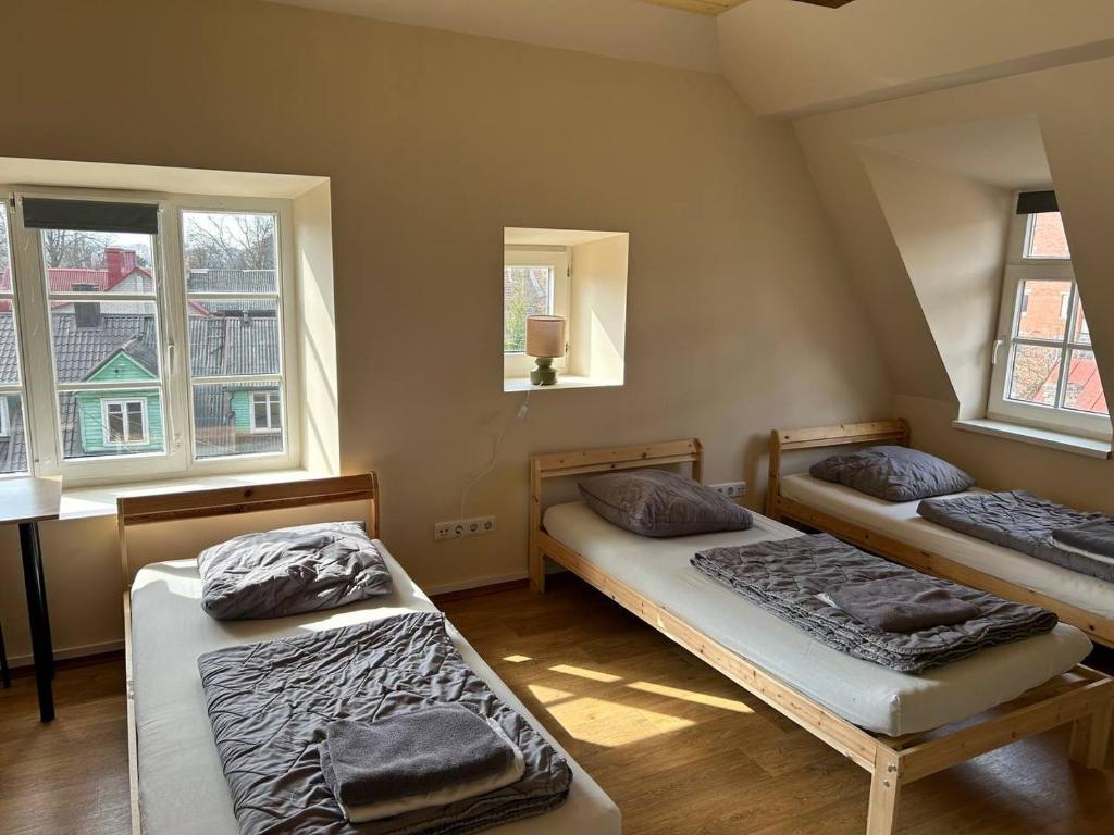 Postel nebo postele na pokoji v ubytování Hostel Filaretai