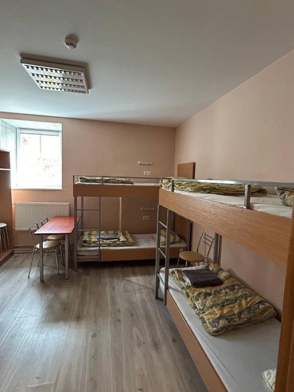 Postel nebo postele na pokoji v ubytování Hostel Filaretai