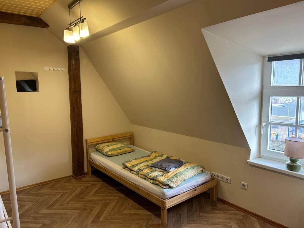 Postel nebo postele na pokoji v ubytování Hostel Filaretai