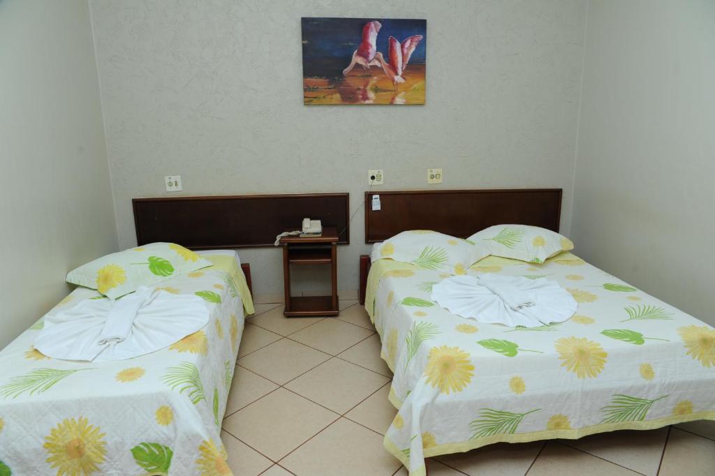 Cama o camas de una habitación en Hotel Paranoá