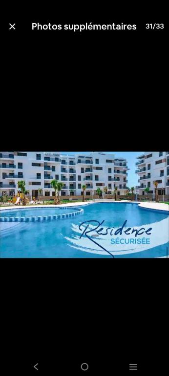 Bazén v ubytování Appartement costa mar Martil nebo v jeho okolí