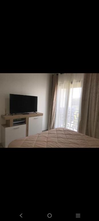 TV a/nebo společenská místnost v ubytování Appartement costa mar Martil