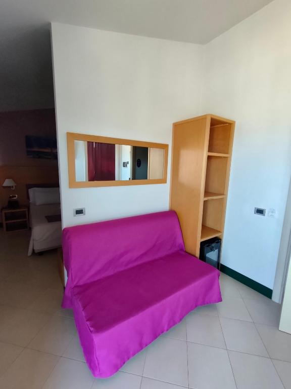 Postel nebo postele na pokoji v ubytování Hotel Belvedere Mindelo, Cabo Verde