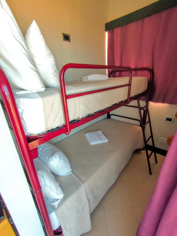 Postel nebo postele na pokoji v ubytování Hotel Belvedere Mindelo, Cabo Verde