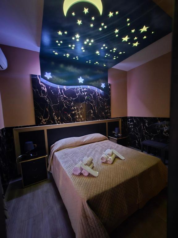 Cama o camas de una habitación en Hotel Iris