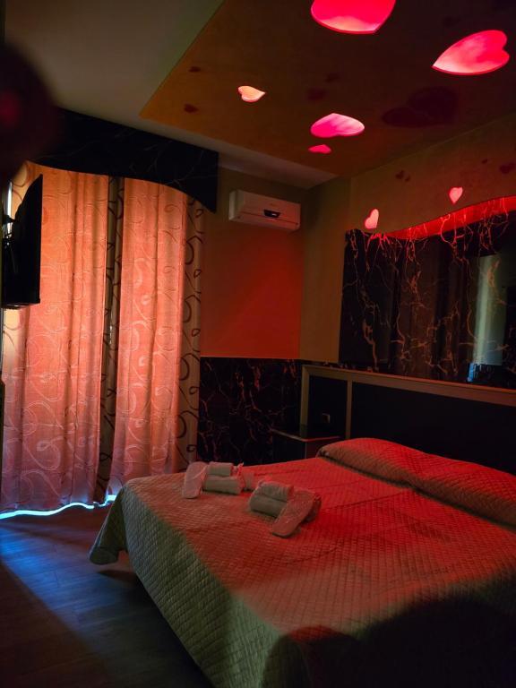 Cama o camas de una habitación en Hotel Iris