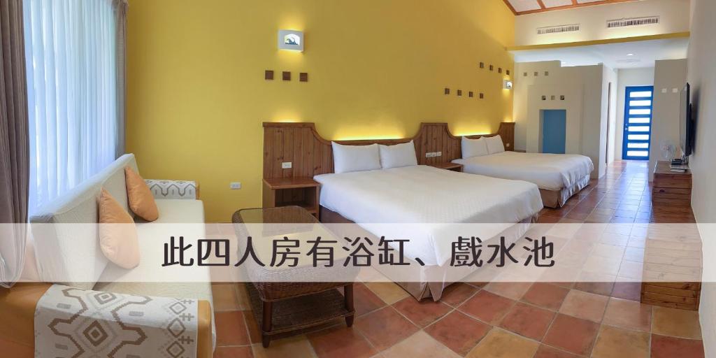 Postel nebo postele na pokoji v ubytování Ding Jia Garden Resort