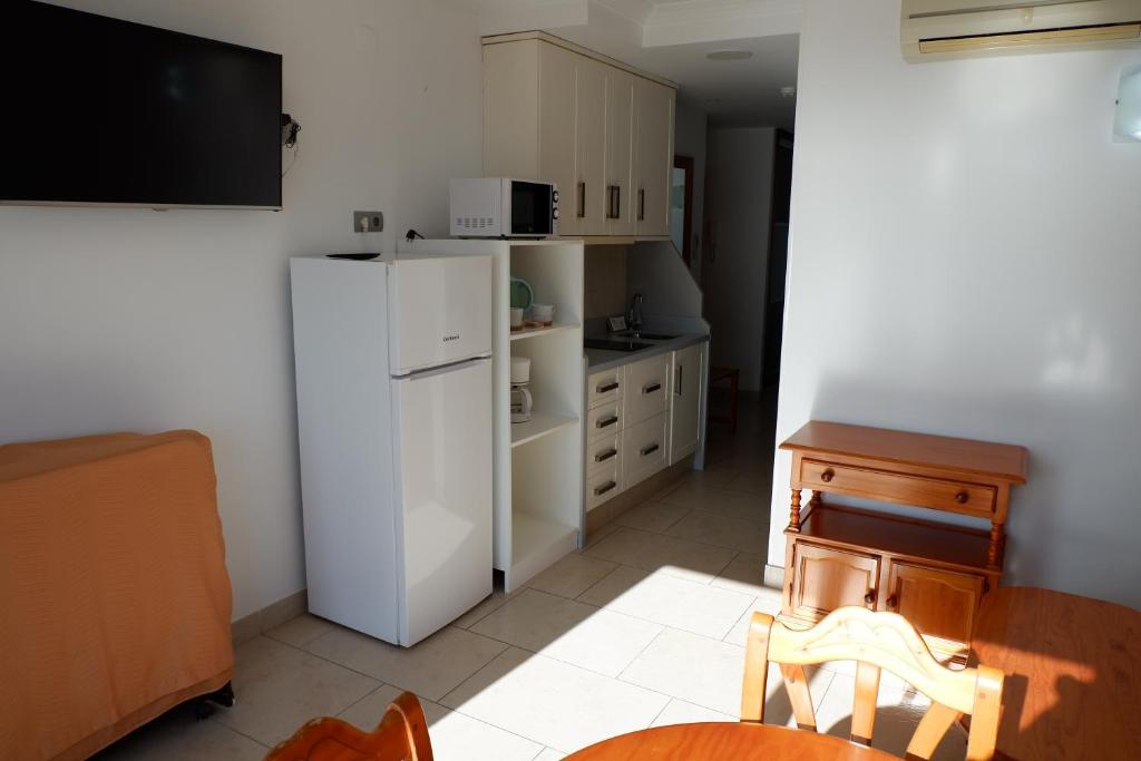 Kuchyňa alebo kuchynka v ubytovaní Apartamentos Caracas