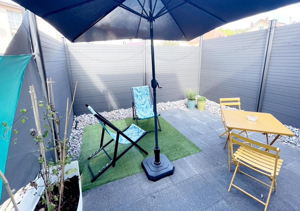 Patio nebo venkovní prostory v ubytování NUITS D'EXIL