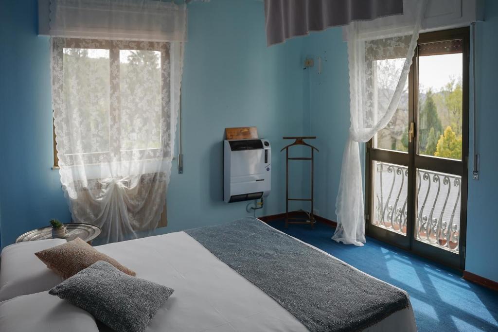 Postel nebo postele na pokoji v ubytování Casa Vicino