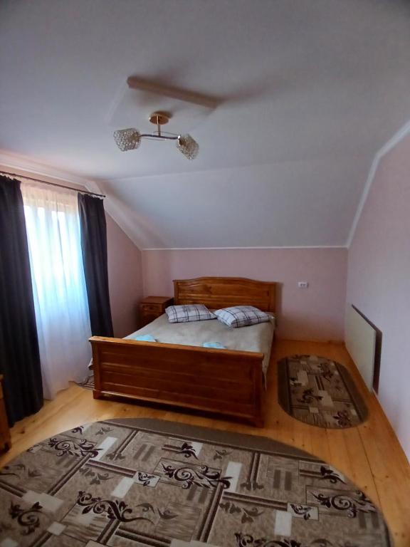 Postel nebo postele na pokoji v ubytování На Пагорбі