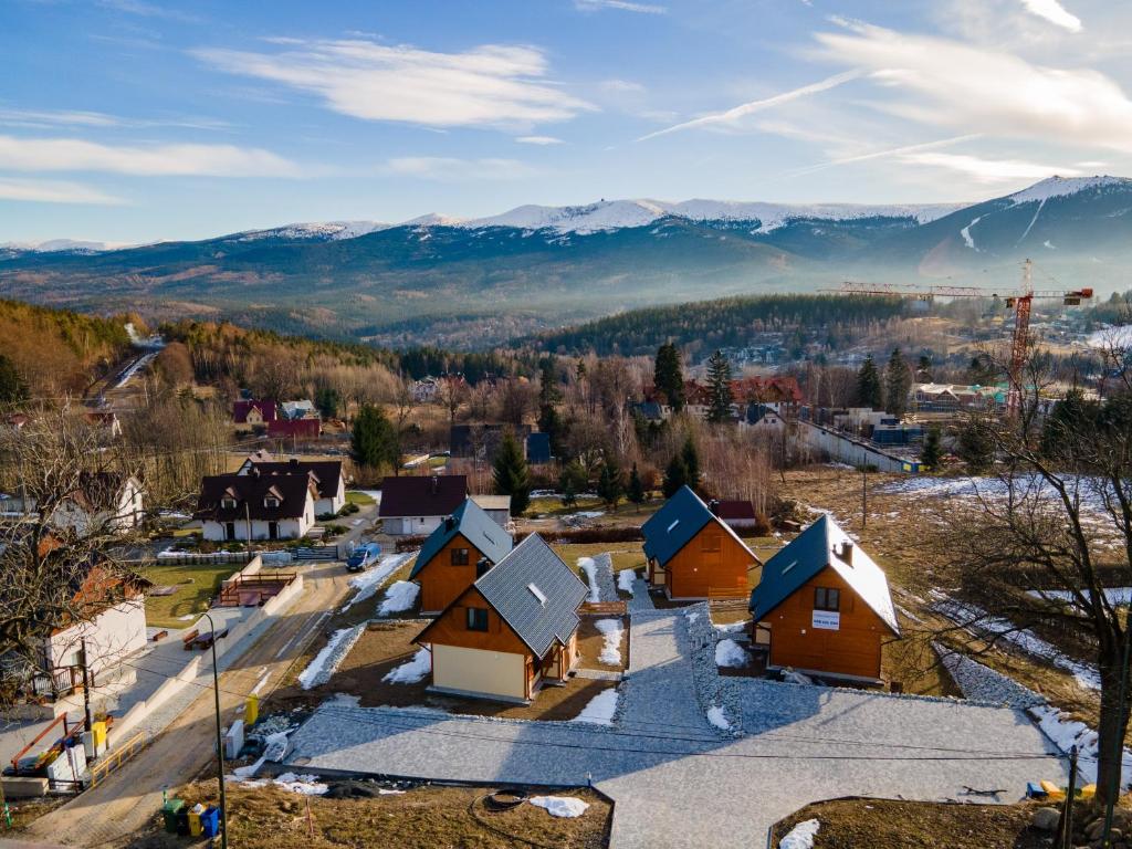 an aerial view of a small village in the mountains at Słoneczne Chatki in Szklarska Poręba