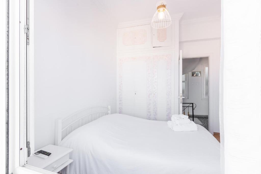 Voodi või voodid majutusasutuse Syros DouBleTS Apartments toas