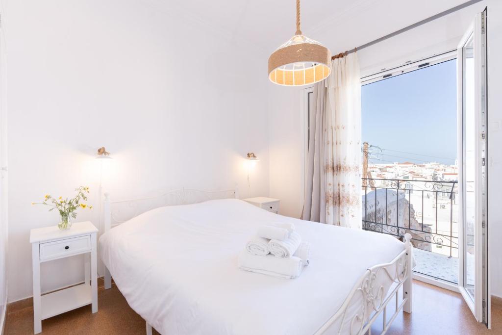 Voodi või voodid majutusasutuse Syros DouBleTS Apartments toas