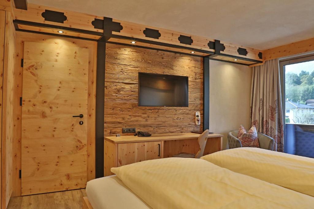Postel nebo postele na pokoji v ubytování Hotel Hauserwirt