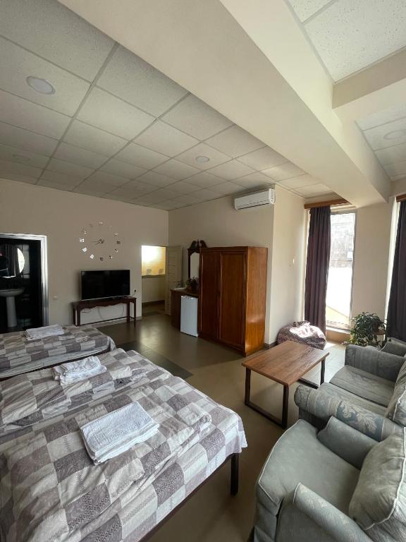 Postel nebo postele na pokoji v ubytování DownTown B&B