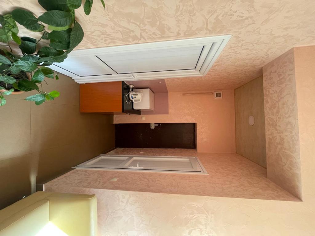 Postel nebo postele na pokoji v ubytování DownTown B&B