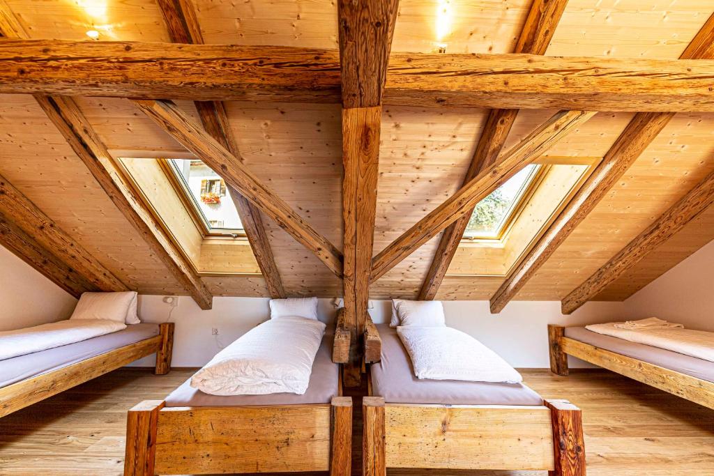Postel nebo postele na pokoji v ubytování Gasthaus Rössli
