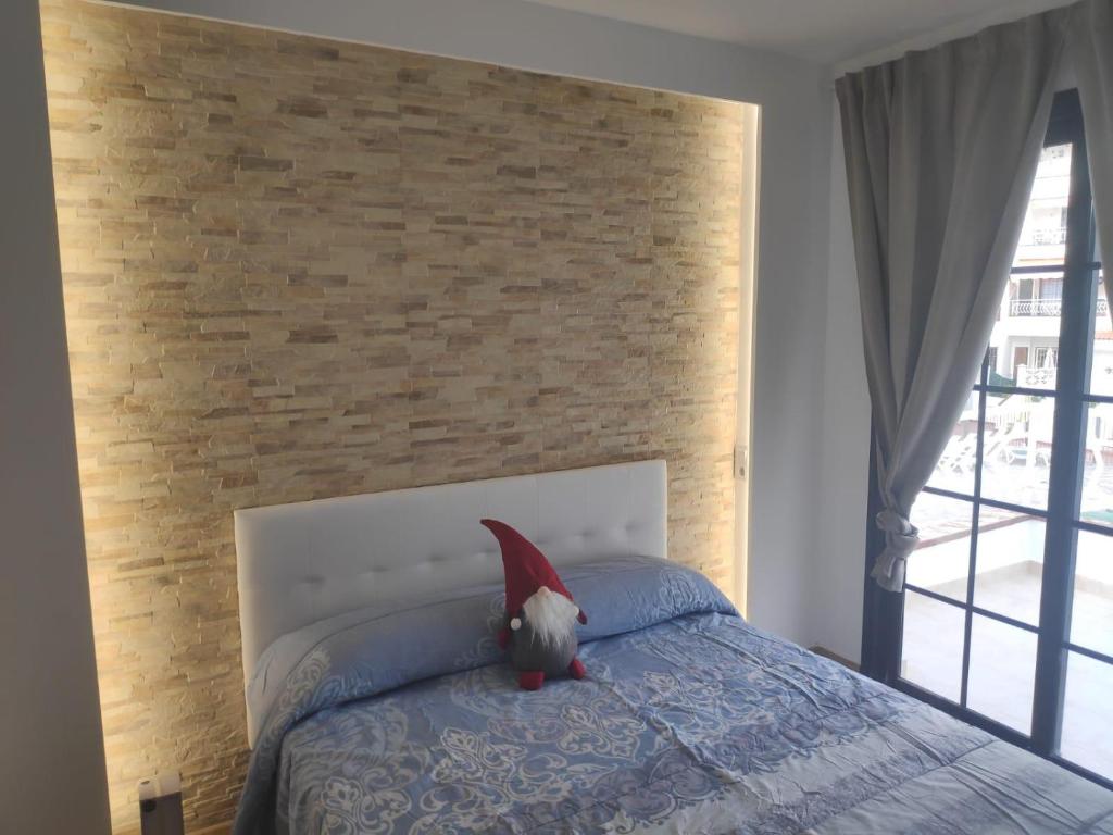 En eller flere senge i et værelse på Cozy and Confortable Flat into Quit Area