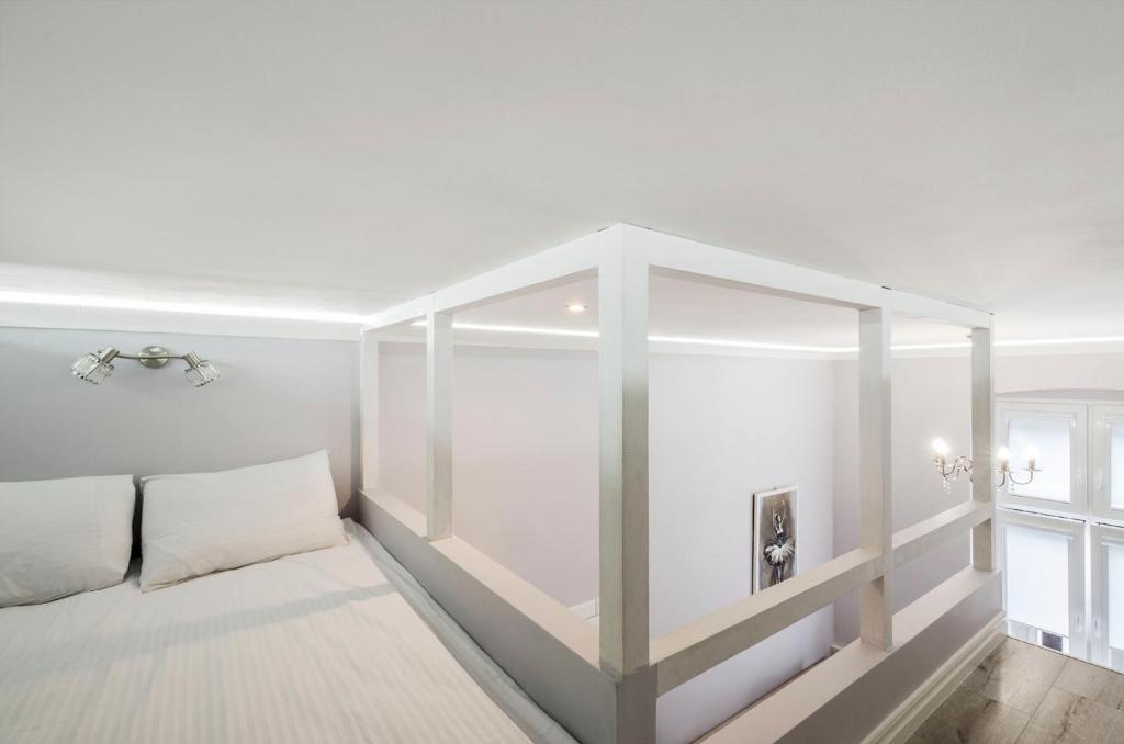 Posteľ alebo postele v izbe v ubytovaní Lumina 2-level apart near Lodz Fabryczna