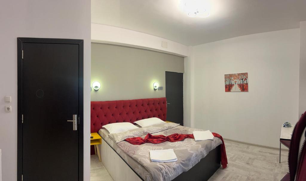 Postel nebo postele na pokoji v ubytování Aigi Rooms Vila