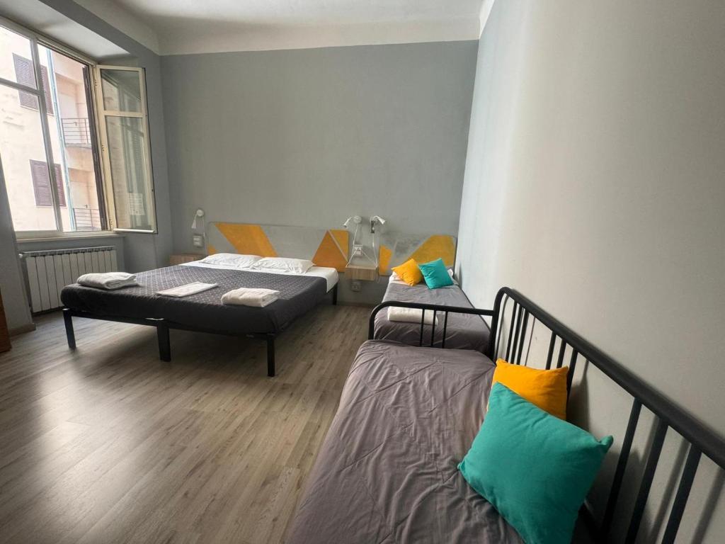 Postel nebo postele na pokoji v ubytování Hotel Big Bang