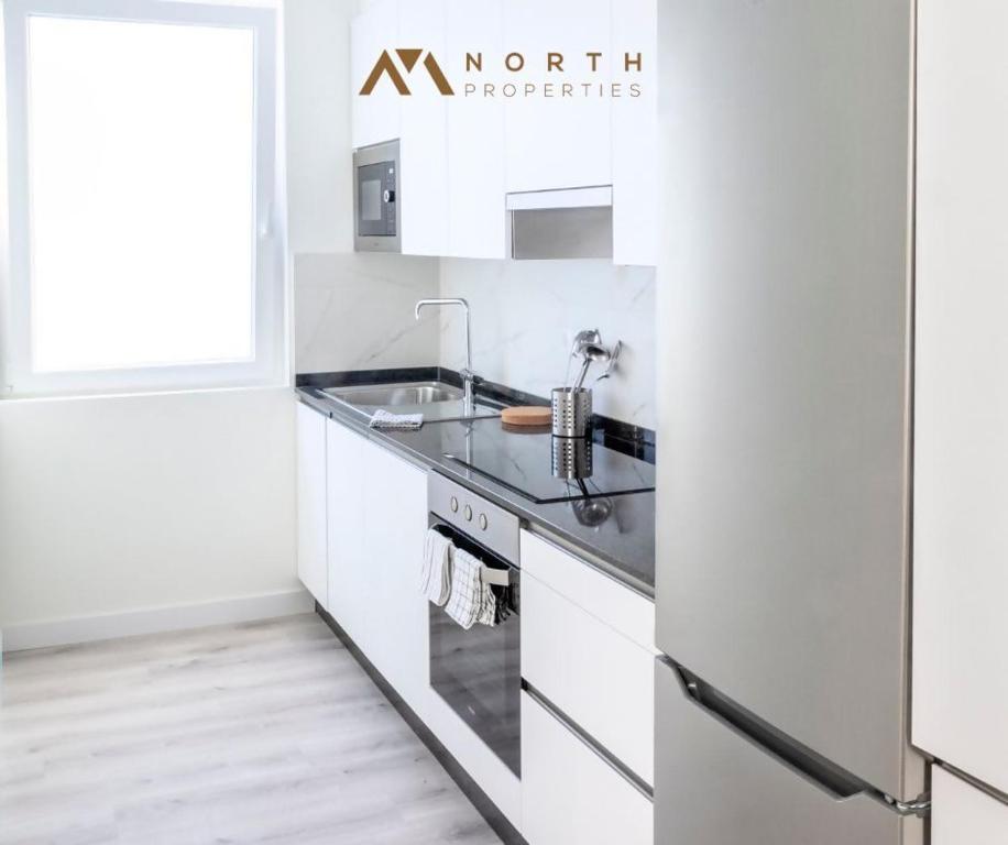 Kuchyňa alebo kuchynka v ubytovaní Apartamento Roncudo 4º planta