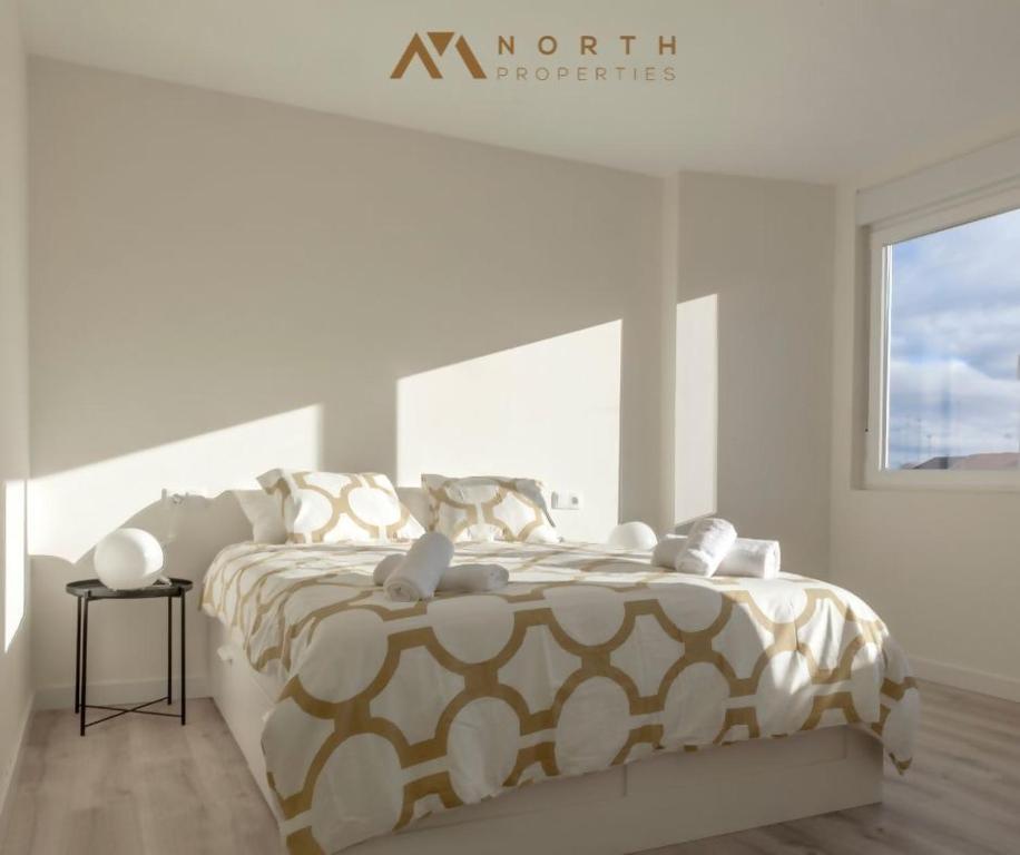 A bed or beds in a room at Apartamento Roncudo Planta Baja