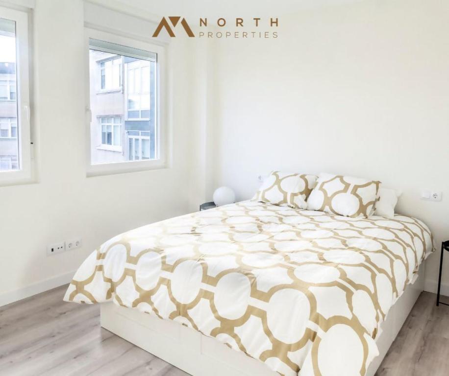 A bed or beds in a room at Apartamento Roncudo Planta Baja