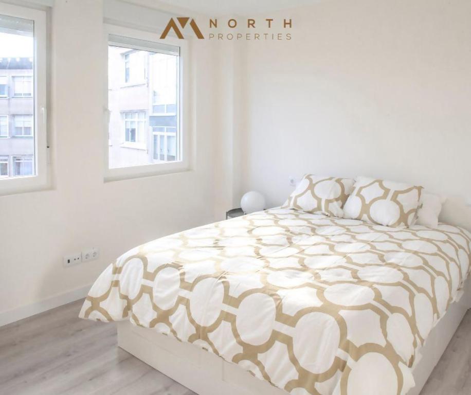 A bed or beds in a room at Apartamento Roncudo Planta Baja