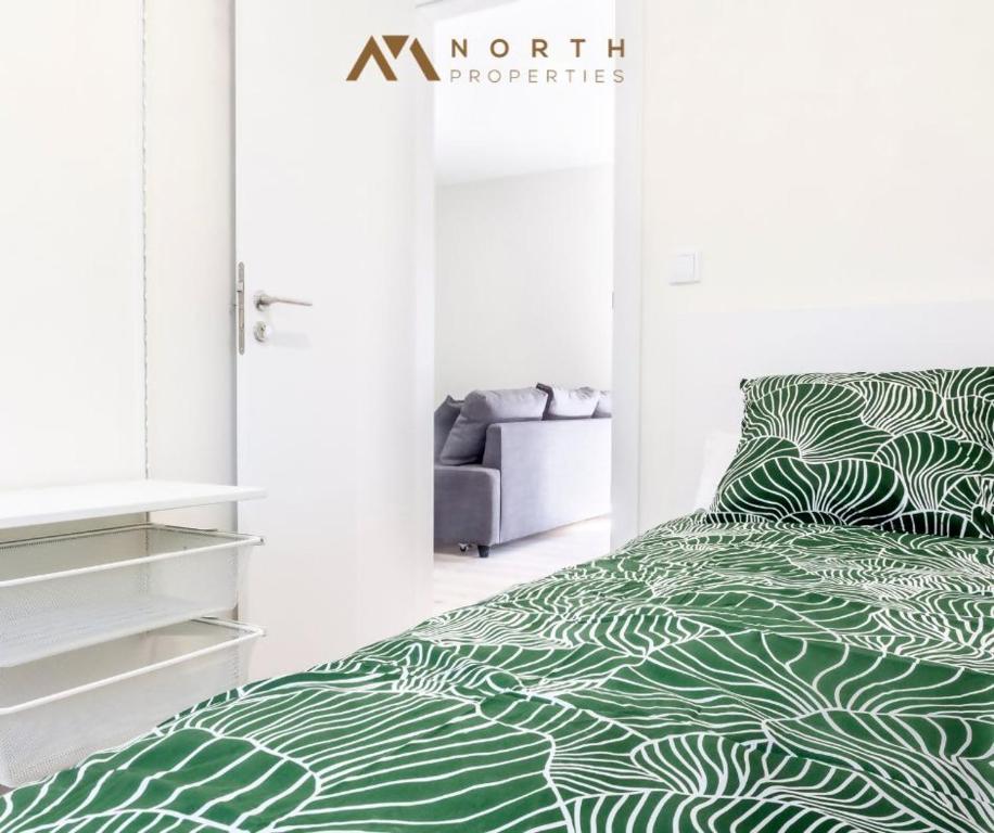 A bed or beds in a room at Apartamento Roncudo Planta Baja
