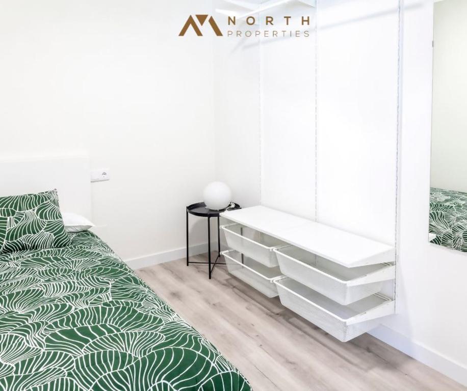 A bed or beds in a room at Apartamento Roncudo Planta Baja